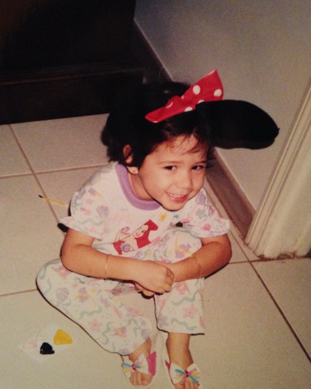 Throwback to my ultimate fashion era: little mermaid PJs, my plastic “big girl” heels, and Minnie ears for maximum princess energy (honestly, not much has changed) 👑🐚✨ #TBT #TinyDivaInTraining #DisneyGirlForever